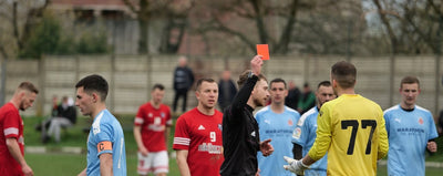 What does a red card mean in soccer?